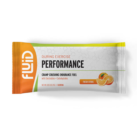 Performance energy bar packaging with orange and white design on a white background