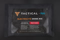 Tactical by Fluid Electrolyte Drink Mix package on a dark background