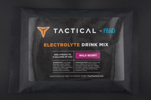 Tactical by Fluid electrolyte drink mix packet on a dark background